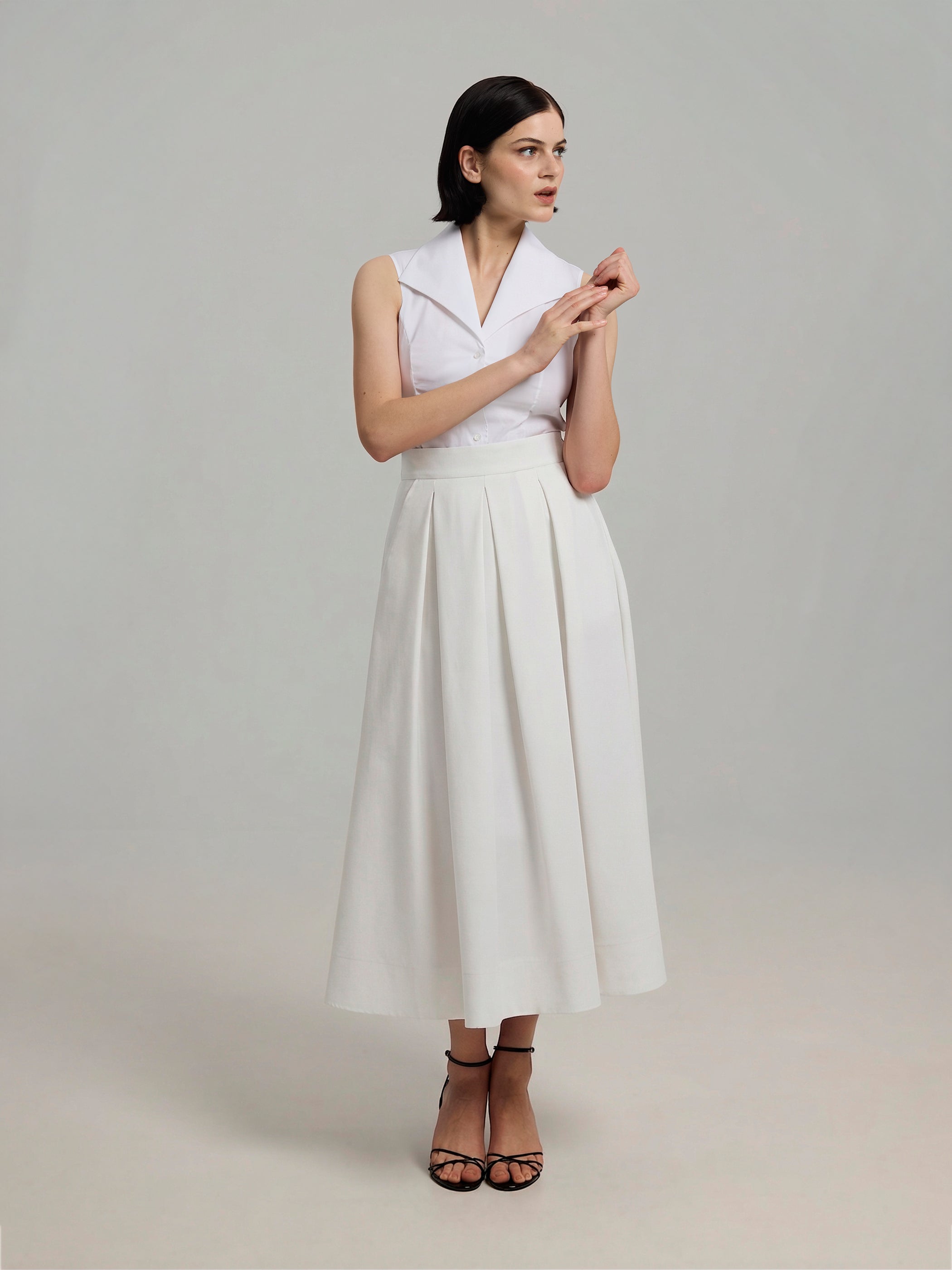Jona White A-line Pleated Midi Skirt with Pockets – Andiata