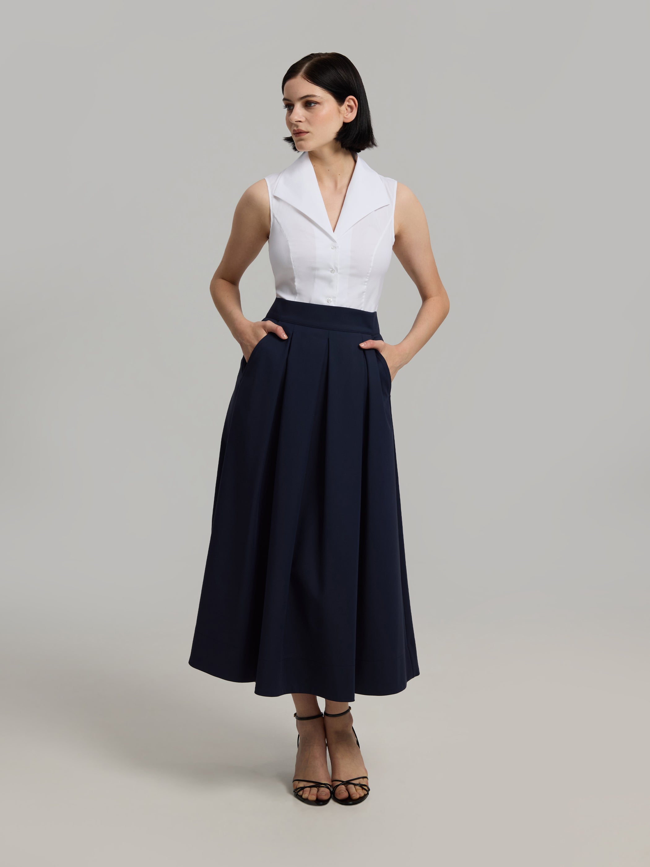 Jona Navy Blue A-line Pleated Midi Skirt with Pockets – Andiata